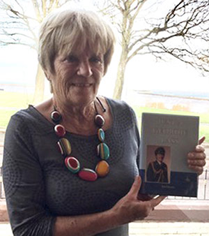 Ann Couston with book