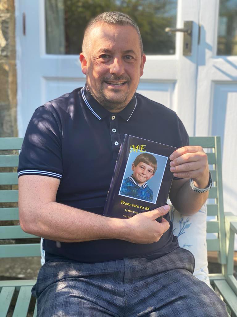 Mick Cassinelli with book