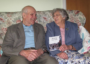 Tom and Rosemary with book